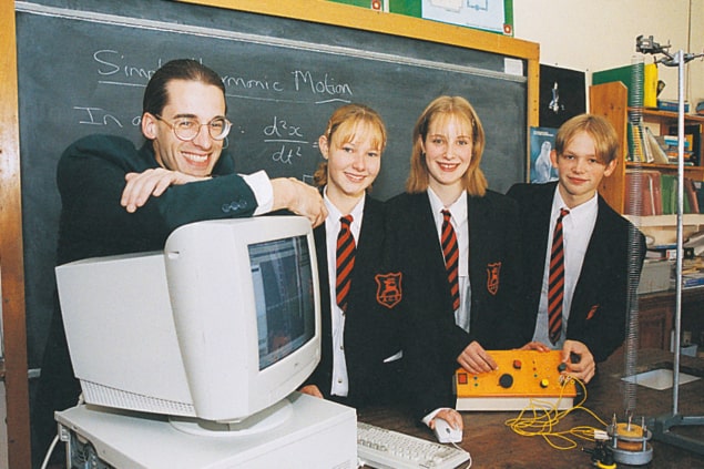 Teacher and students at Appleby Grammar School