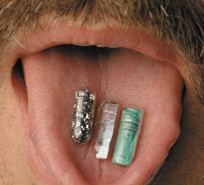 Photo of tablets on a tongue