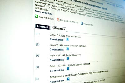 Photo of a computer monitor displaying an online academic paper