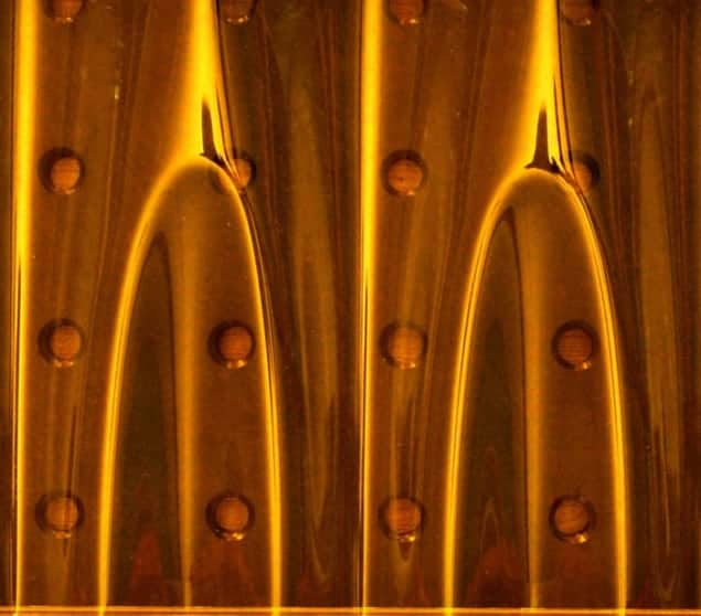 Image of wrinklons in a plastic sheet