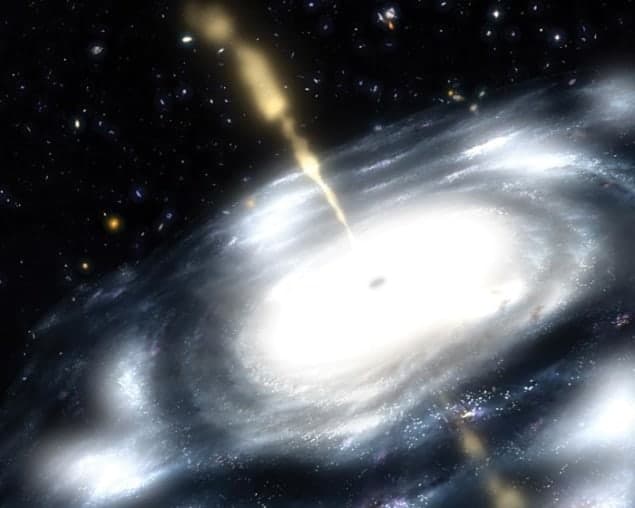 Artist's impression of a supermassive black hole at the core of a young, star-rich galaxy Artist's impression of a supermassive black hole at the core of a young, star-rich galaxy