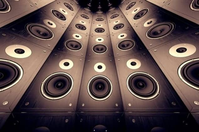 Illustration of a wall of speakers