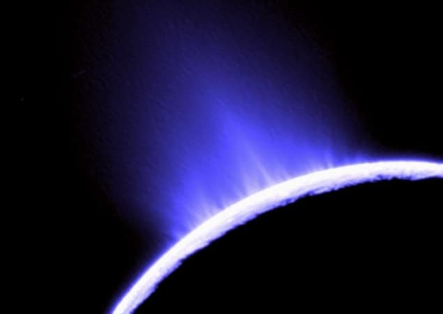 Image of geysers of water and ice erupting from the surface of Enceladus taken by the Cassini spacecraft