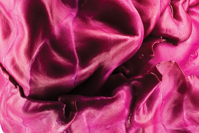 Bright-pink folds on the surface of a cabbage