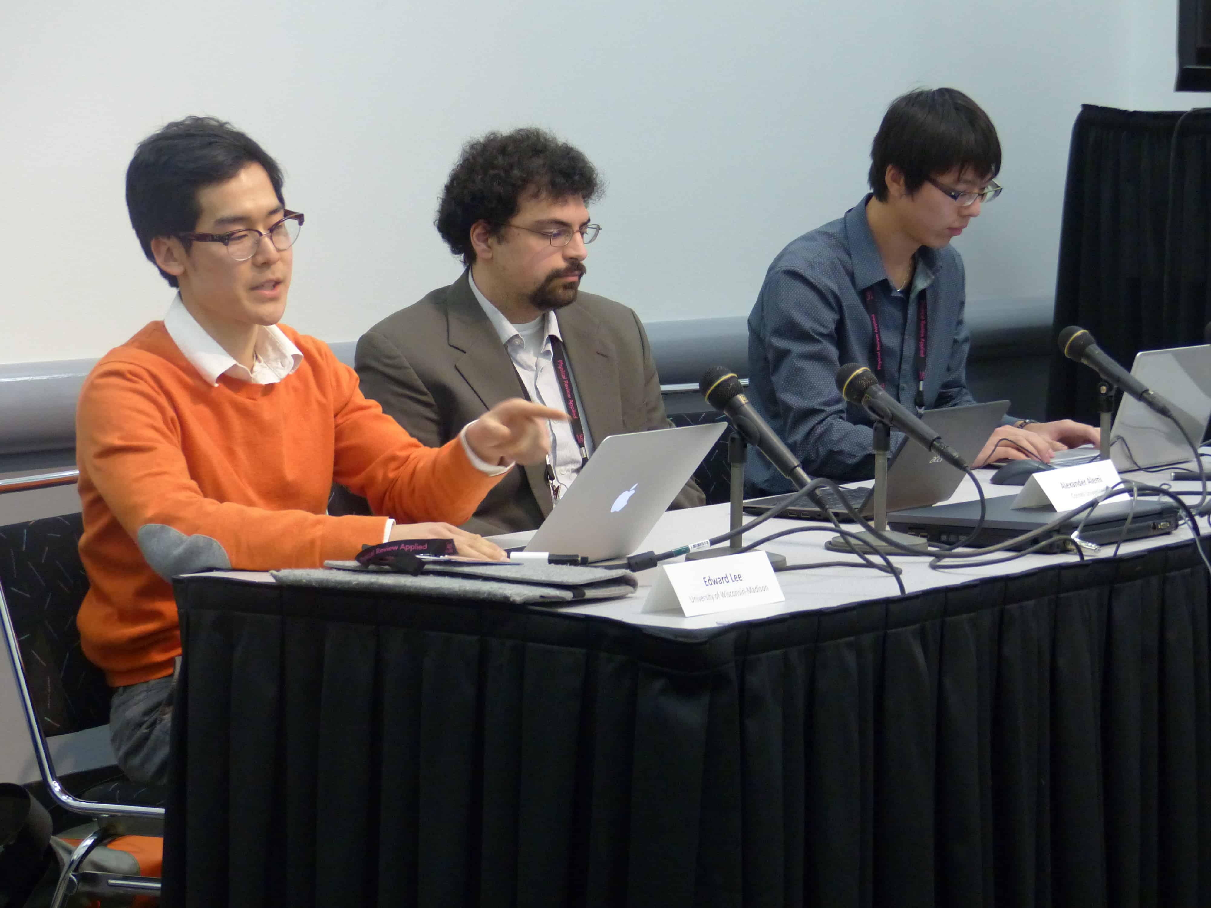 Lee talks about his supreme court model, as Alemi and Zeng listen in.