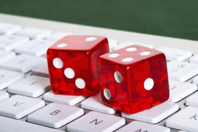 Photograph of dice on a keyboard