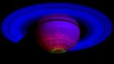 Saturn and its rings lit up by aurorae