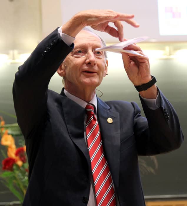 John Pendry holding up origami