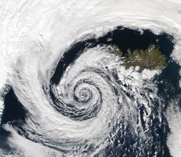 Satellite image showing a huge swirl of clouds centred off the coast of Iceland