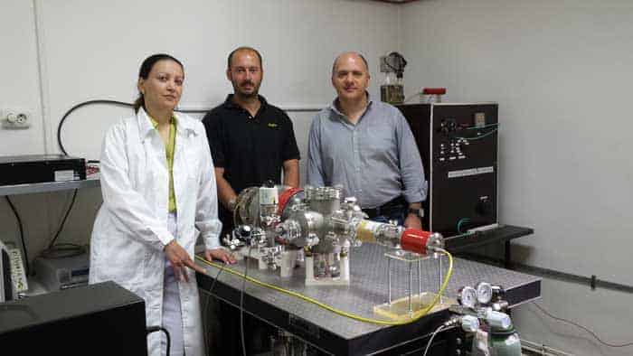 Photograph of the researchers Dorina Ticoş, A Scurtu and Catalin Ticoş in the lab