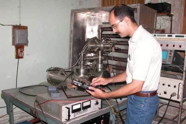 A photograph of physicist Ahmed Al-Tabbakh at Al-Nahrain University in Baghdad working in his lab
