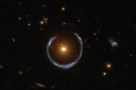 Hubble Space Telescope image of the gravitational lensing of a distant source of blue light