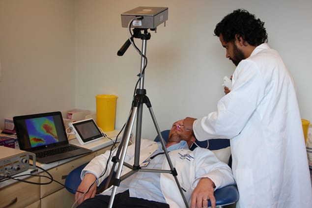 Photograph of researchers testing the new imaging technique