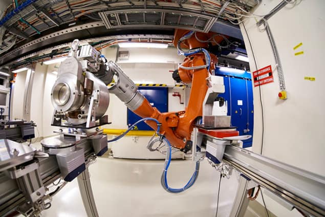 Photograph of a robot handling a target at CERN-MEDICIS