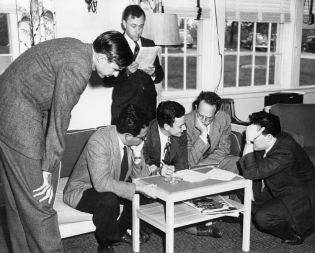 Photograph of John Wheeler (standing, centre) was surprised and delighted to act as PhD supervisor for Richard Feynman (seated, centre)