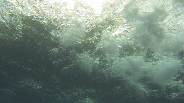 Underwater photograph of bubbles near the ocean surface