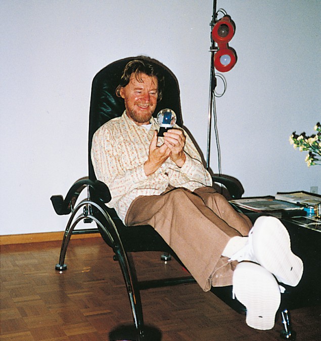 John Bell relaxing in his apartment in Geneva