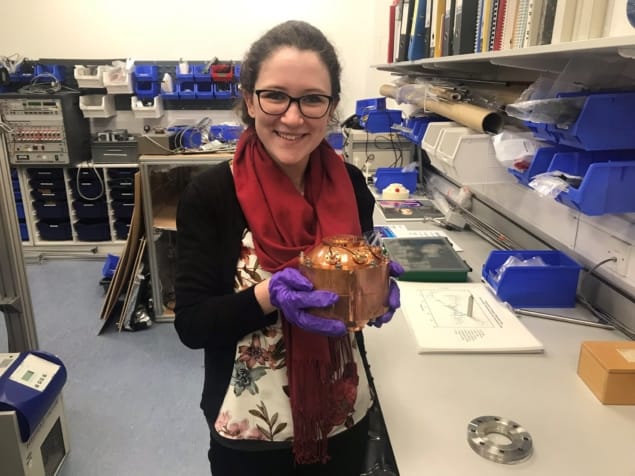 Sarah Tesh with a replica of the device used to measure temperature at the National Physical Laboratory