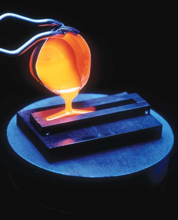 Photo of radioactive material being mixed with molten glass for storage