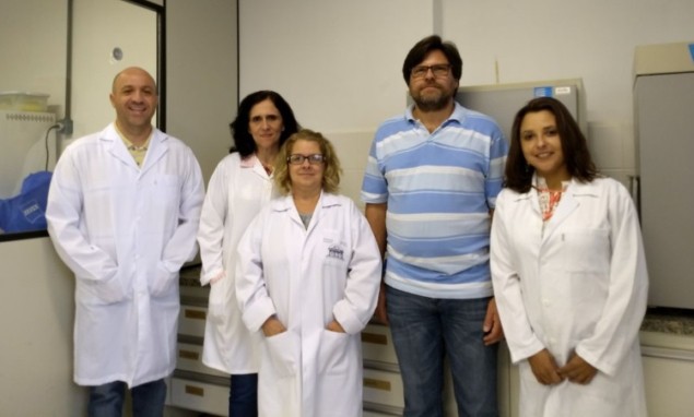 Rigo and co-authors in the lab