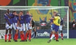 Roberto Carlos of Brazil scores against France