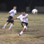 Two men playing football