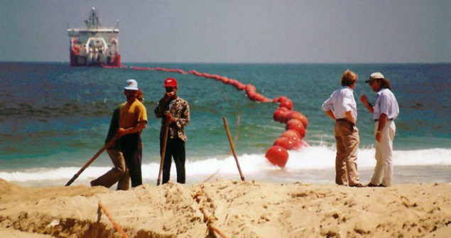 Photo of submarine cables being brought ashore Photo of submarine cables being brought ashore