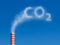 Illustration of carbon dioxide emissions from an industrial tower