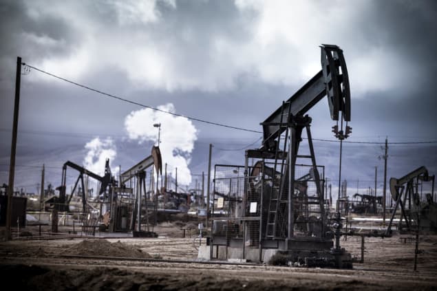 oil-wells-19952805-iStock_Pgiam Photo of nodding donkeys oil extraction