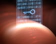 An image of a key with ones and zeros superimposed on it