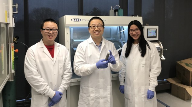 From left to right: Yixiu Wang, Wenzhuo Wu, Ruoxing Wang. Wenzhuo Wu is holding a bottle of Te nanowires solution