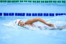 Photo of a person swimming in the pool