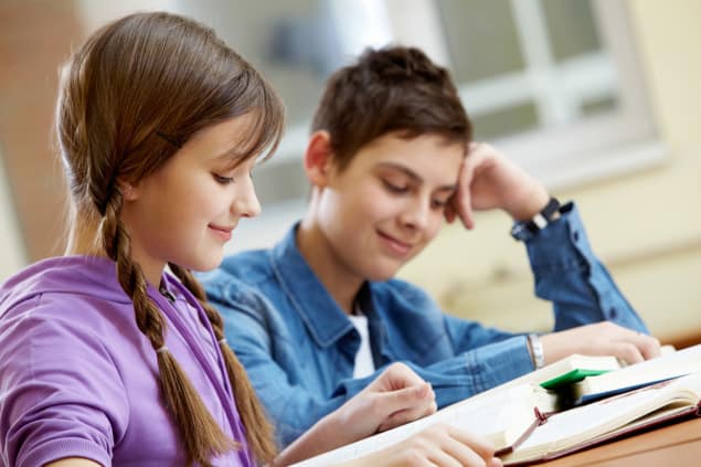 Image of two children reading