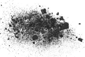 A pile of black charcoal against a white background