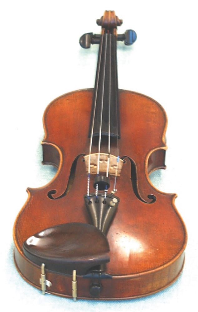 A copy of a Guarnerius violin made by the19th-century French violin maker Vuillaume, shown from the player's perspective.