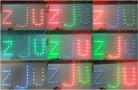 Photo showing green, red and blue lights arranged to make the letters ZJU