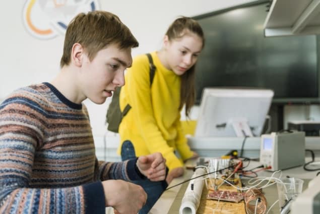 undergraduate phyiscs-1059427704-iStock_AlexPotemkin Image of two undergraduates in the lab