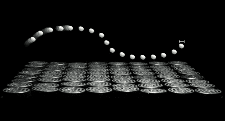 multiple photos of a levitating polystyrene bead