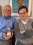 Photo of Robert Alicki and Alejandro Jenkins with a bust of Thales