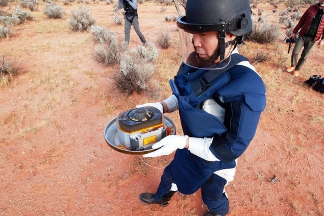 Asteroid capsule being retrieved