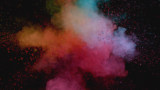 Colourful chemical powders exploding