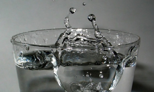 Photo of splashing water in a glass