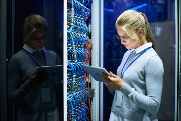 woman working at a computer data centre