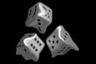 Image of three distorted, melting dice