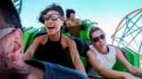 People riding a rollercoaster