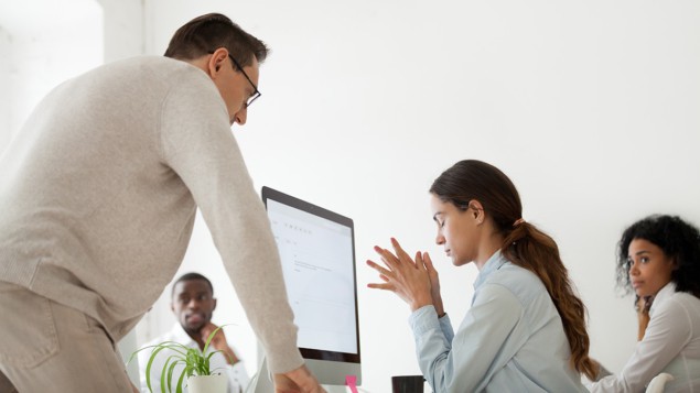 A boss scolding an employee