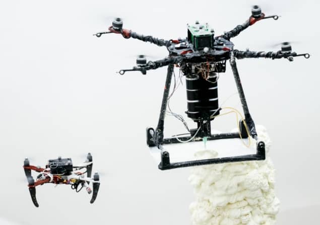 Drones building a structure using 3D printing