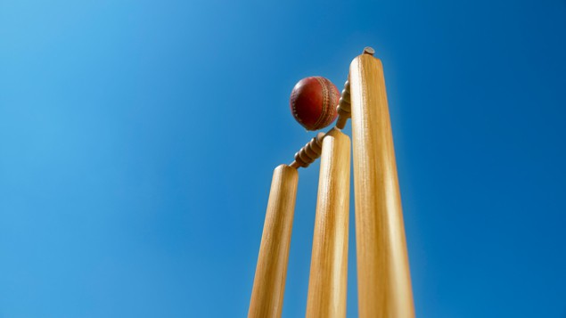 Ball hitting cricket stumps