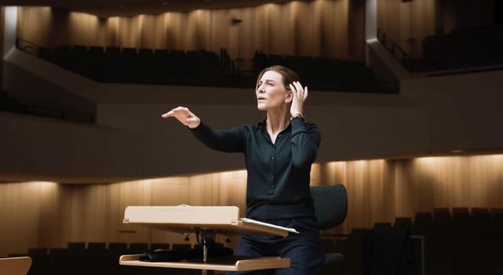 Still of the film Tár showing Cate Blanchett conducting