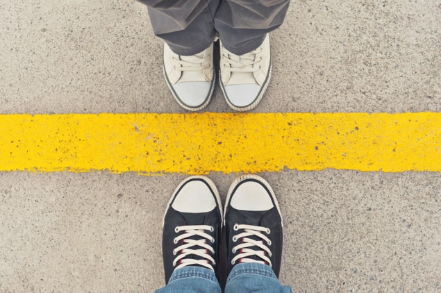 shoes between a yellow line